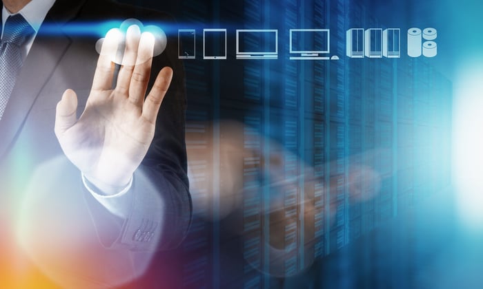 Businessman hand working with a Cloud Computing diagram on the new computer interface as concept