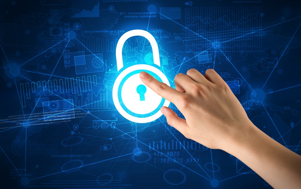 Female hand touching blue lock with charts and graphs in the background